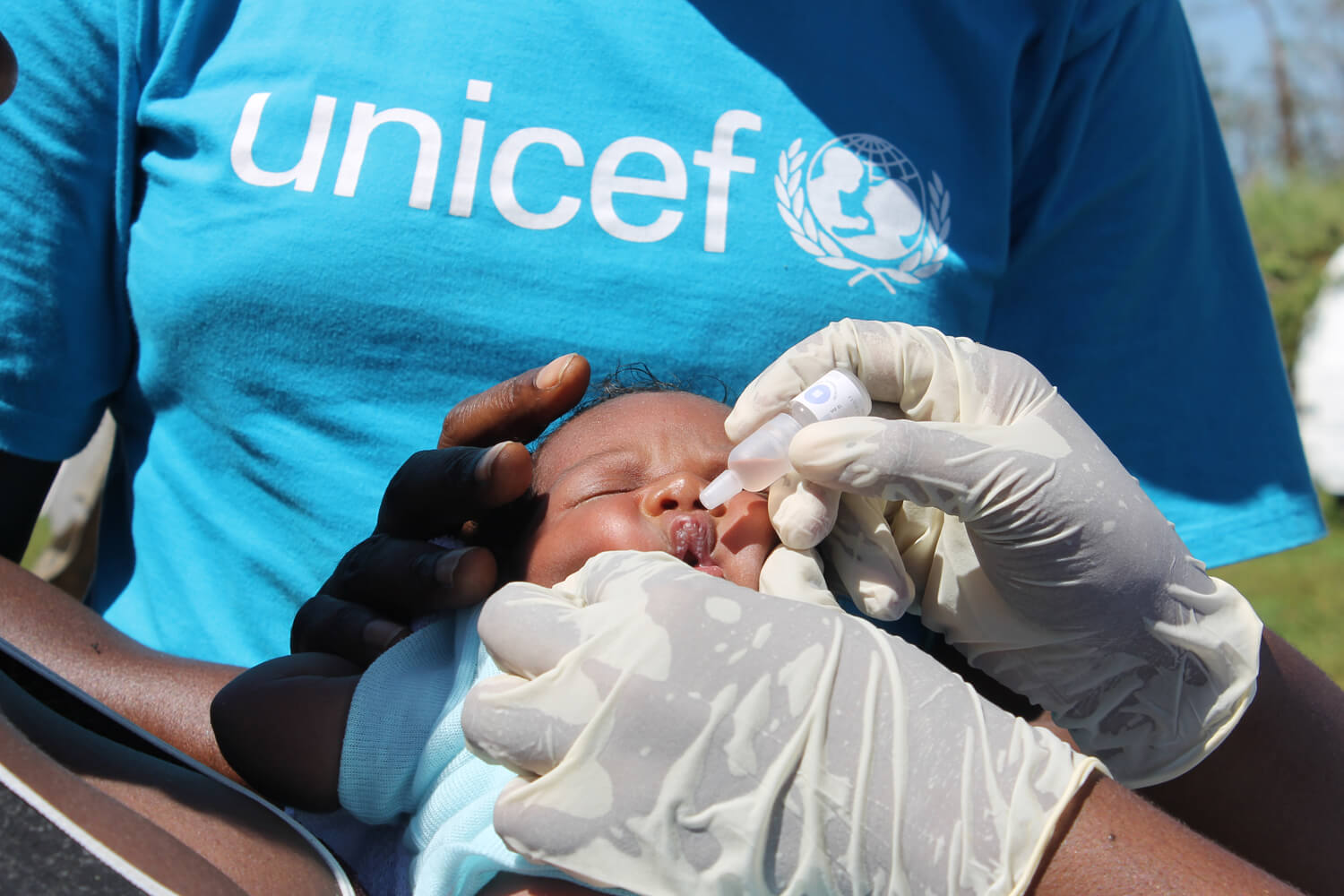 Baby Penali is vaccinated against polio by a Unicef immunisation team in Vanuatu.