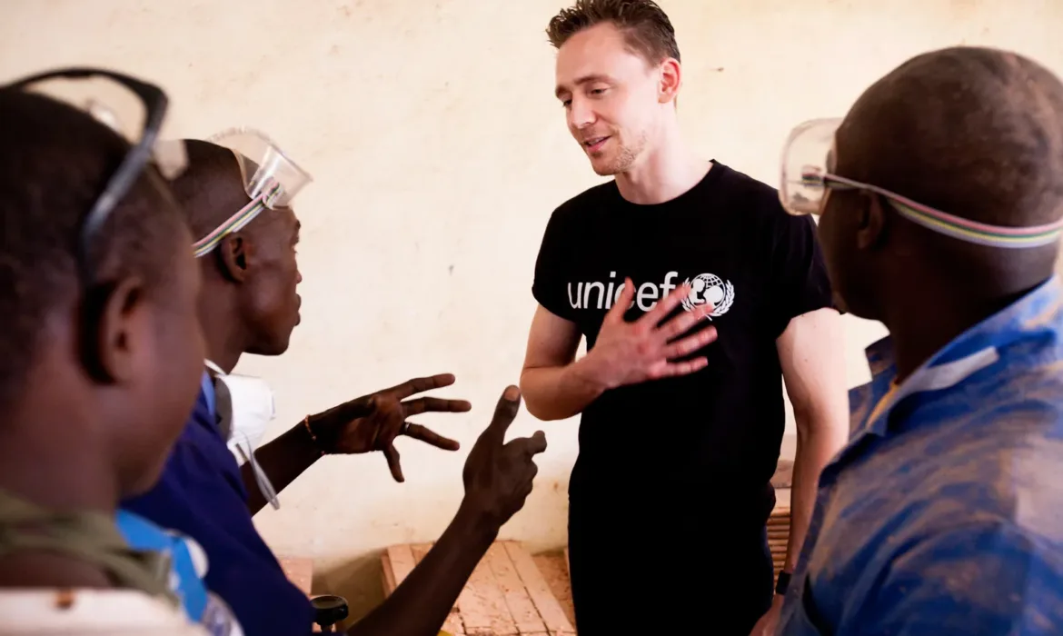 Tom visits a vocational training centre in Kankan and meets young people in the woodwork class. Their training is funded by the Peace Building Fund in Kankan. UNICEF worked closely with the government to develop a programme to support young people who had been in the armed forces.